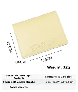 Detail showing macaron yellow PU leather household booklet cover with 10 inner slots