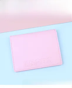 Detailed 45-degree angle view of pink faux leather household register document cover