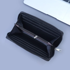 Top view of black long wallet interior with eight card slots and zipper compartment