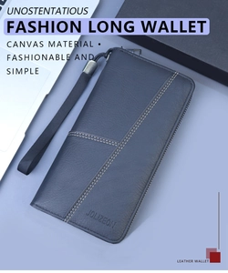Detail showing deep blue leather texture with dual stitching and wrist strap on long wallet