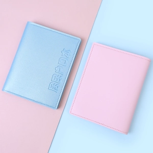 Blue and pink PU leather document folders with embossed text and fine stitching details