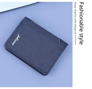 Detailed view of deep blue canvas slim wallet featuring the white Johlzeon logo on the front