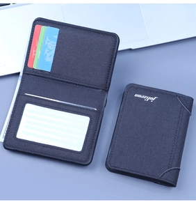 Detailed interior of vertical canvas wallet with multiple card slots and clear ID window