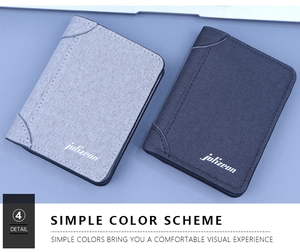 Detailed view of canvas wallet stitching and texture in light grey and dark blue tones