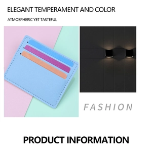 Detail of light blue leather card holder showing multi-slot design and neat stitching