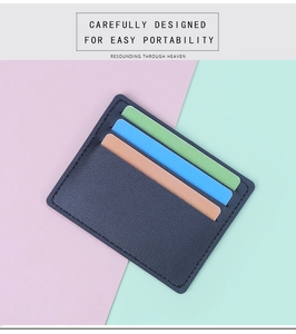 Detail showing the 6-slot slim leather card holder with cards in a contrast background