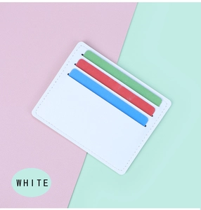 Macro detail of white slim card holder with lychee grain texture and multiple slots