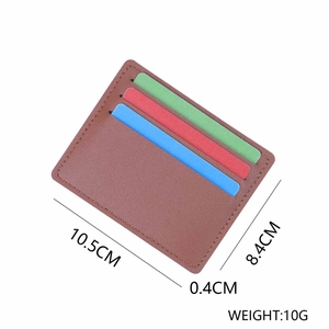 Slim brown leather card holder with 6 slots, showing dimensions 10.5cm x 8.4cm x 0.4cm