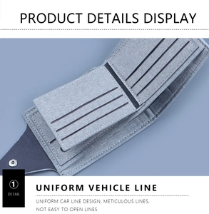 Detail of light grey short canvas wallet with multi-card slots and neat stitching