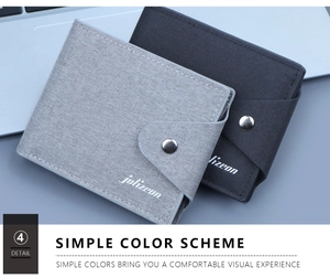 Close-up of canvas wallets in grey and black featuring durable metal snap button closures