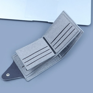Grey canvas bifold wallet for men with multi-card slots and secure metal snap closure