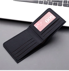 Detail view of the slim canvas wallet interior featuring multiple card slots and ID window