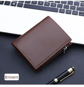 Detailed view of a brown leather men's wallet with metal zipper on a business office desk