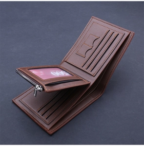 Close-up of brown leather men's bifold wallet showing card slots and zipper pocket