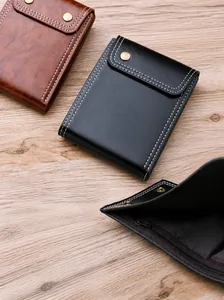 Detailed view of men's short oil wax leather wallet with snap closure and zipper pocket