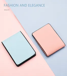 Detail view of stitched edges and oil-sealed borders on slim pink and blue card holders