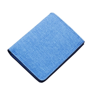 Vertical slim bifold canvas wallet for men in blue denim fabric with reinforced stitching