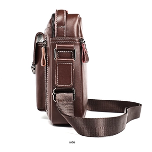 Side view of dark brown leather messenger bag featuring contrast stitching and metal hardware