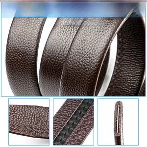 Detail of dark brown lychee grain leather belt with automatic buckle track and stitching