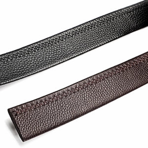 Close-up of black and brown lychee grain leather belts with unique cross-stitch edges