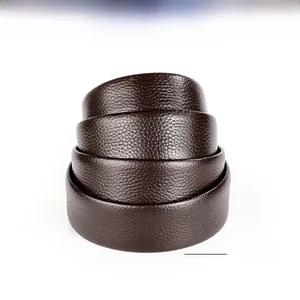 Detailed texture of dark coffee top layer cowhide leather belt with lychee grain pattern