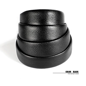 Close-up detail of black top layer cowhide leather belt with premium lychee texture