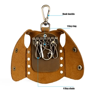Detail view of genuine leather key case with hook buckle and internal metal rings