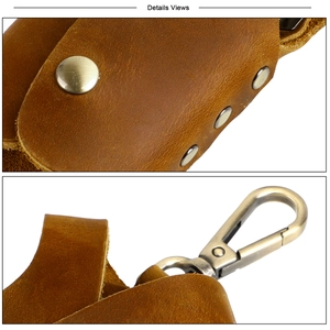 Detail view of brown genuine leather key pouch with vintage bronze metal snap and hook
