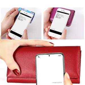Detail showing RFID blocking technology on leather wallets to protect bank card data