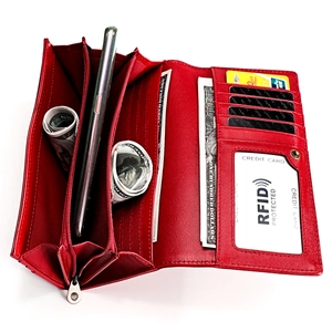 Detail of red leather long wallet interior showing RFID card slots and phone pocket