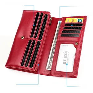 Detail of red leather long wallet with 11 card slots, RFID protection and zipper pocket