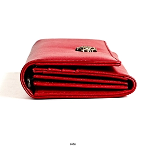 Detail view of the accordion-style multi-layer interior of a red leather RFID wallet