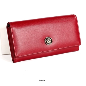 Close-up of red genuine leather wallet with vintage gold metal rose clasp and fine texture