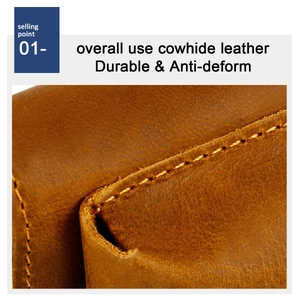 Macro shot of durable brown cowhide leather texture with orange contrast stitching detail