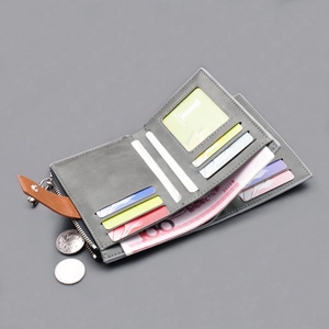 Short charcoal canvas wallet for men featuring multi-card slots and a metal zipper pocket