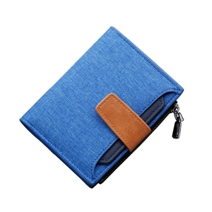 Sky blue canvas bifold wallet for men featuring brown leather strap and side zipper