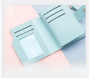 Detail view of tri-fold wallet interior featuring multiple card slots and zipper pocket