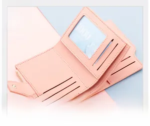 Pink faux leather women's wallet detail showing photo slot, card slots and zipper pocket