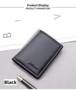 Close-up of black bifold wallet in lychee grain leather with elegant business pen