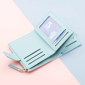 Multi-slot light blue trifold wallet with zipper pocket and card slots for women