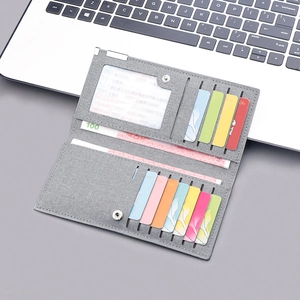 Slim light grey canvas long wallet with multiple card slots and clear ID window