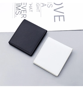 Détail de portefeuilles Saffiano noir et blanc minimalistes avec coutures soignées