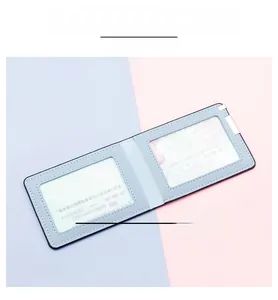 Internal view of light blue leather driver license holder with dual transparent windows