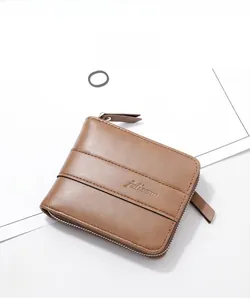 Close-up of brown leather wallet with horizontal stitching and wraparound metal zipper