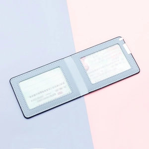 Slim light blue leather driver's license holder with dual transparent card windows