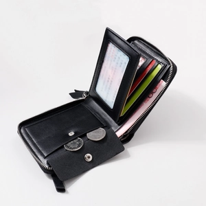 Men's black zip-around leather wallet with multiple card slots and coin pocket