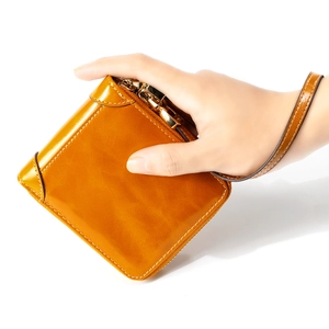 Portefeuille vintage en cuir ciré avec dragonne et fermeture éclair pour femmes