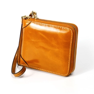 Portefeuille vintage en cuir ciré marron pour femme avec zip et protection RFID