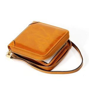 Portefeuille vintage en cuir marron avec fermeture éclair en L et dragonne pour femme RFID