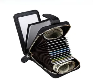 Internal view of leather card holder showing accordion style slots and clear ID window